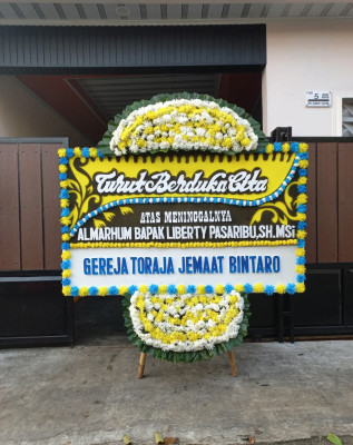 Papan Bunga Duka di Huta Bayu Raja